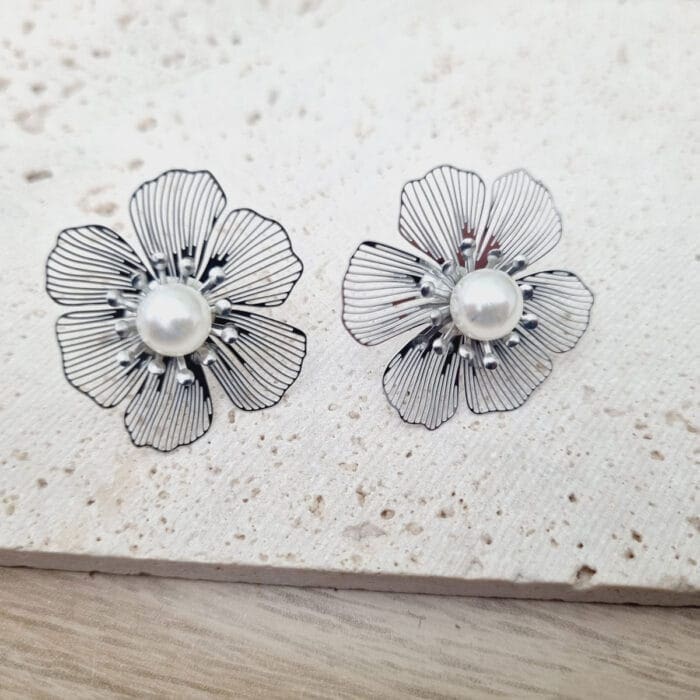 10 Ατσάλινα σκουλαρίκια λουλούδια - Image 1