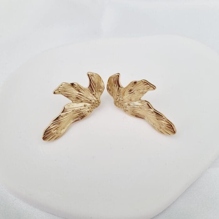 20240408_134330 Ατσάλινα σκουλαρίκια μισό λουλούδι - Image 1