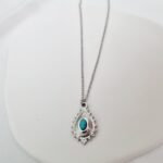 Ατσάλινο κολιέ με έθνικ στοιχείο με ημιπολύτιμο λίθο