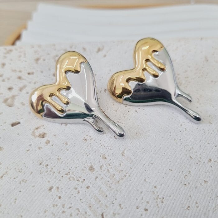 20250313_114238 Ατσάλινα σκουλαρίκια λιωμένες καρδιές - Image 1