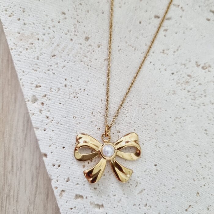 20250327_134510 Ατσάλινο κολιέ με φιόγκο με πέρλα - Image 1