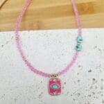 Κολιέ με κρυσταλλάκια και ατσάλινο στοιχείο με μάτι