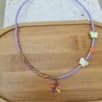 Κολιέ από χάντρες με λουλούδι και πεταλούδες - Image 4