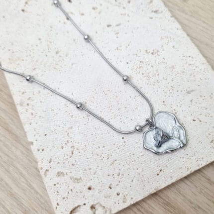 Aτσάλινο κολιέ με καρδιά με τριαντάφυλλο