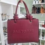 Τσάντα ώμου με κόμπους