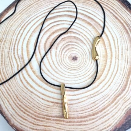 Μακρύ κολιέ με ατσάλινη γυριστή ράβδο