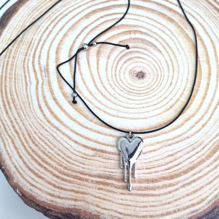 Κ63 Μακρύ κολιέ με ατσάλινη λιωμένη καρδιά - Image 1