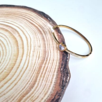 Ατσάλινο χρυσό βραχιόλι καρδιά με διάφανο κρύσταλλο