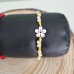 Βραχιόλι με ατσάλινο λουλούδι - Image 2